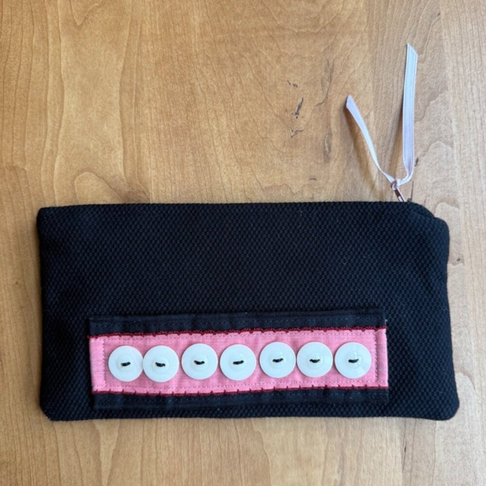 One-of-a-kind Black Hand Clutch with Button Detail